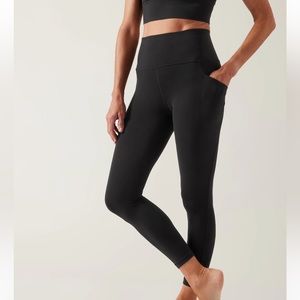 Athleta Salutation stash pocket 7/8 tight